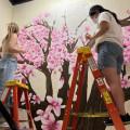 Brooke McCammond'21 and Hannah Kang'22 led painting murals for Beloit Health System late last spring.